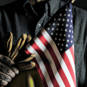 What is Reshoring in American Manufacturing? Man holding american flag